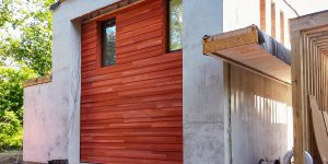 Garagedeur padoek hout