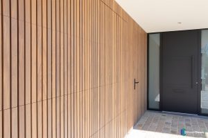 Houten sectionaaldeur van afrormosia hout